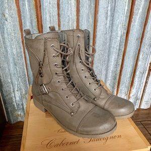 Woman’s Guess Boots.